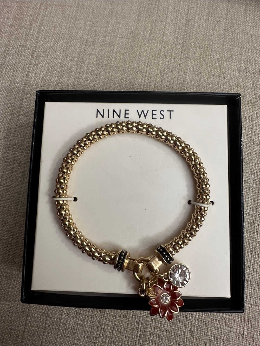 Nine West Gold Braided Bracelet with Red Flower Charm and Clear Crystal, NWOT